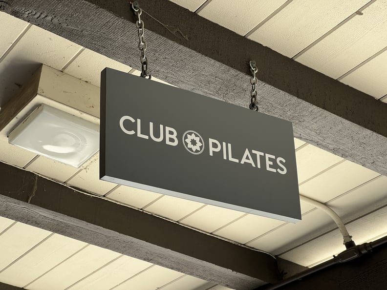 Sign for Club Pilates, a pilates gym in Lafayette, California, how much does Club Pilates cost?